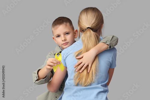 Hugging little children wit...