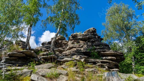 Devil's Hillfort complex on sunny summer day. Iset Park, Iset village, Sverdlovsk region, Russia. Hiking and walking photo