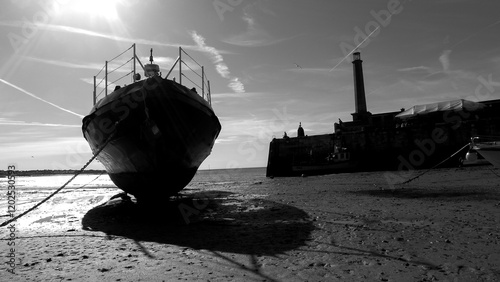 Margate, England: Lighthouse, Pier, Low Tide, and the City Coastline 09 17 2012 photo