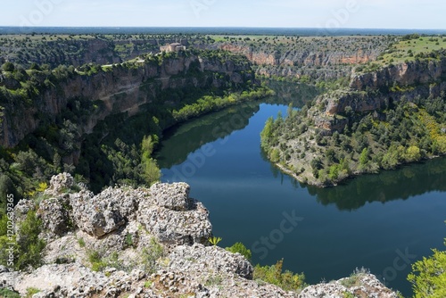 A winding river flowing through a beautiful, rocky gorge lined with lush vegetation and steep cliffs, gorge, Duratón River Gorges Natural Park, Duraton, Parque Natural de las Hoces del Río Duratón, Sepulveda, Segovia, Valladolid, Castilla y León, Spain, Europe photo