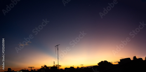 Sunset over the city. Panoramic view of the city.