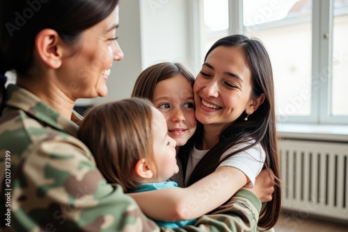 Emotional Reunion Between a Military Service Member and Family in a Bright, Welcoming Interior Space After Deployment