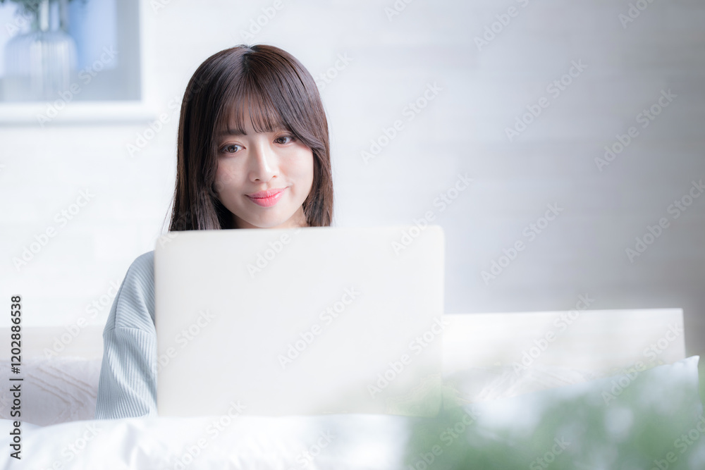 Prone woman doing computer on bed Lifestyle, freelance, working and busy work image Prone woman doing computer on bed Lifestyle, freelance, working and busy work image