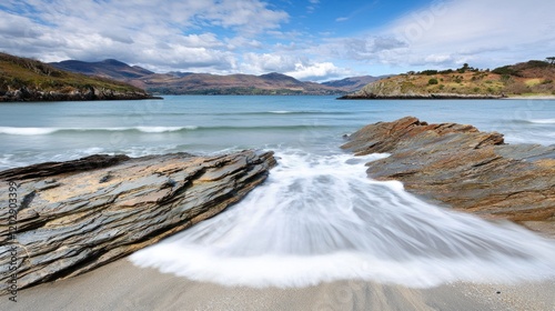 Waves washing over coastal rocks