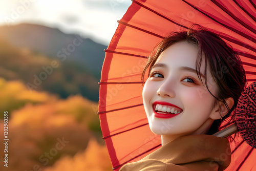 Smiling Woman Holds Red Par...