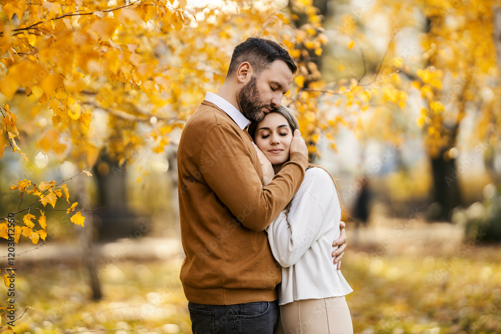Tender sweet couple in love hugging in city park. Tender sweet couple in love hugging in city park.