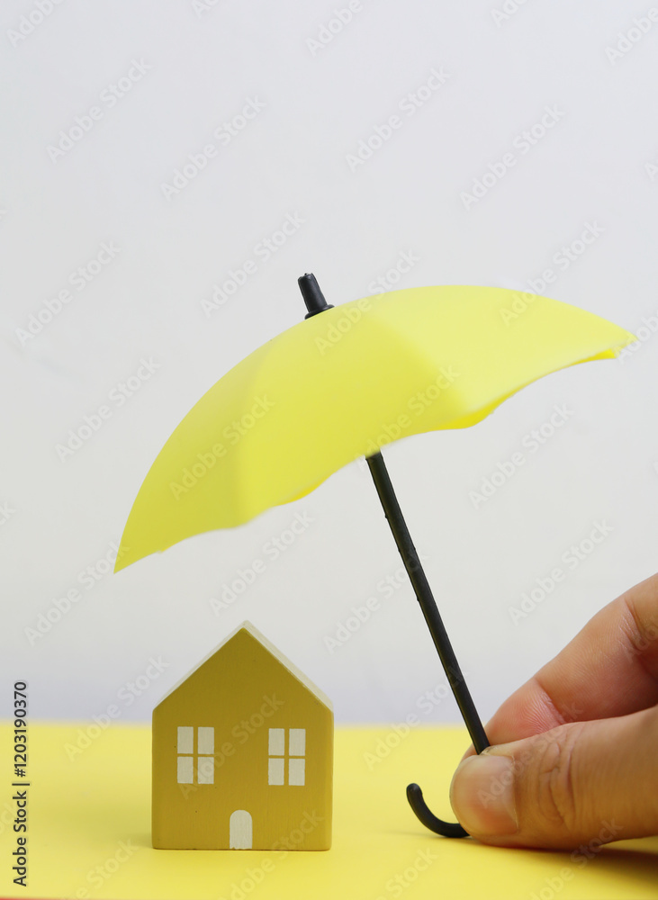 Φωτογραφία Insurance and assurance concept, Wooden figure family with house icon for protec