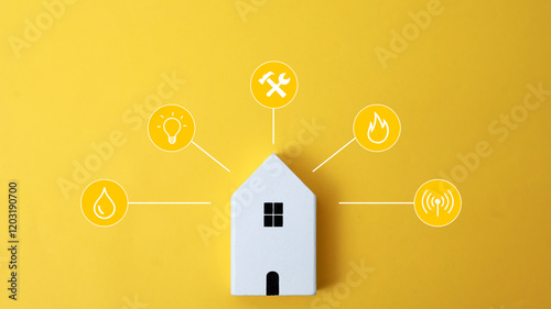 Miniature house and symbols of public utilities on a yellow background Top view Flat lay