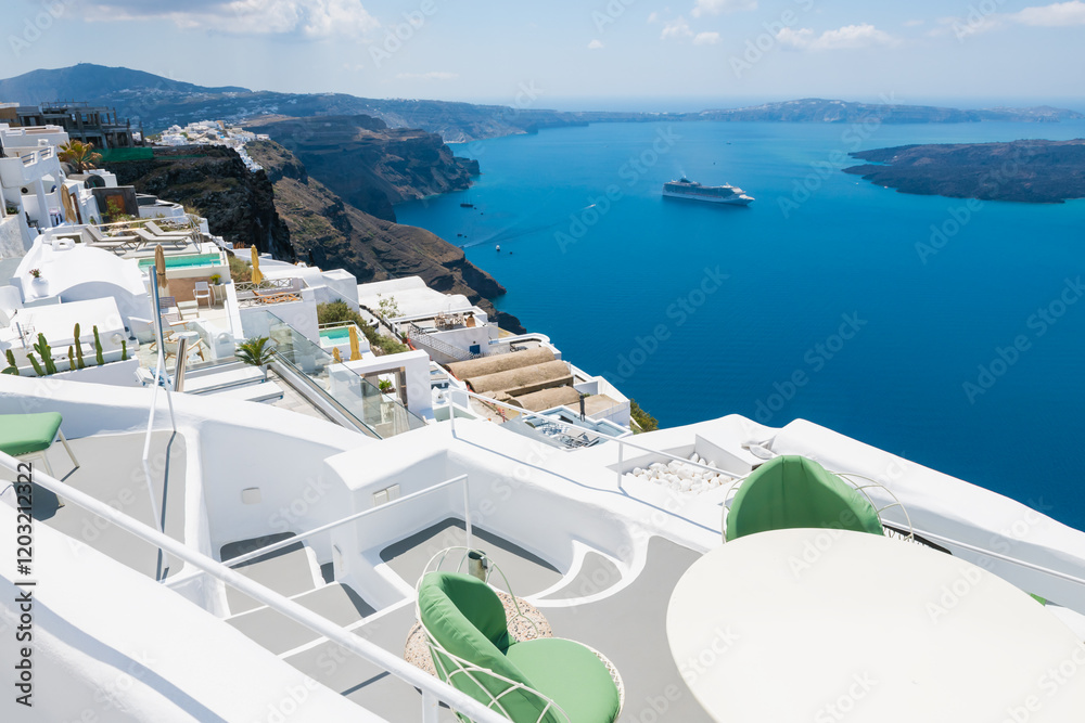 White architecture in Santorini island, Greece. Beautiful terrace with sea view at sunny day.