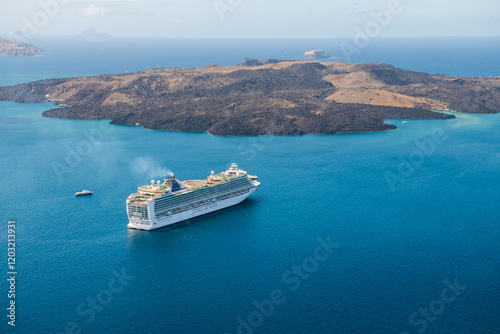 Obraz na płótnie Santorini island, Greece. Cruise ship near the coast. Blue sea and the blue sky. w salonie