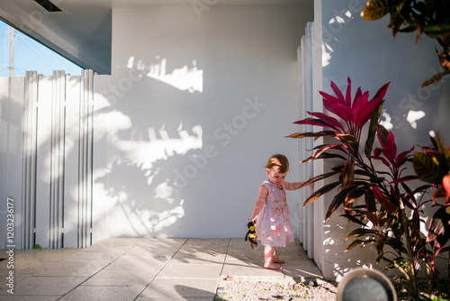 Young girl playing outside in Florida photo