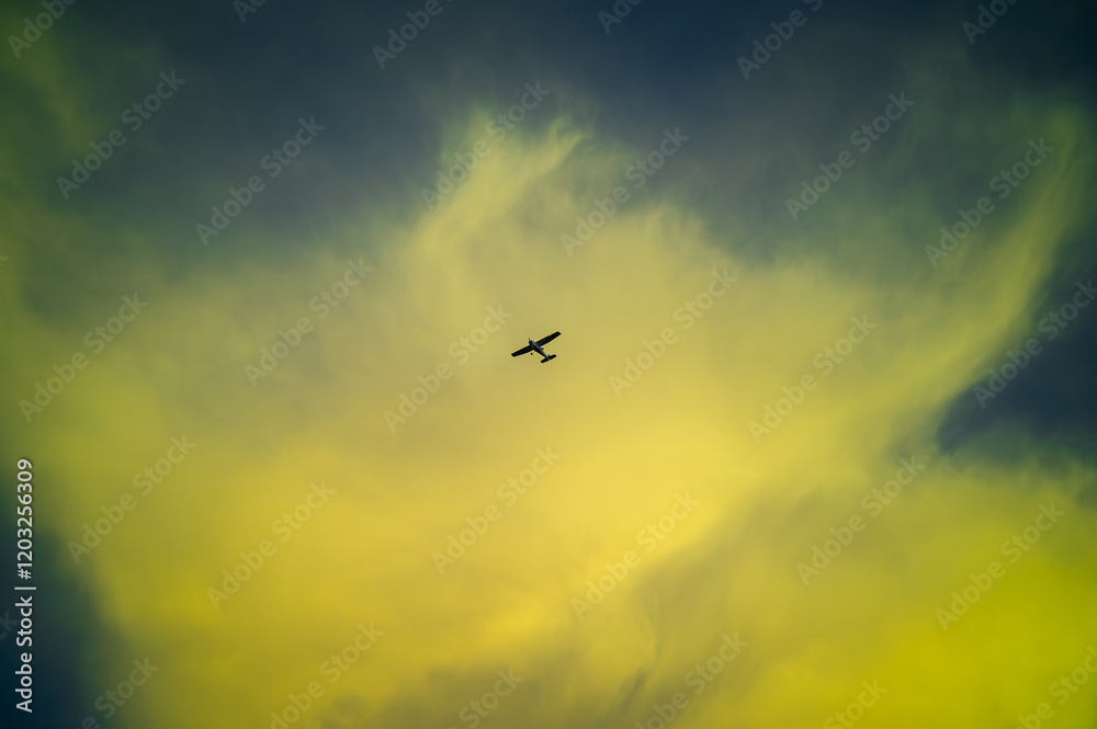Low angle view of airplane flying against blue sky backgrounds at dusk Low angle view of airplane flying against blue sky backgrounds at dusk