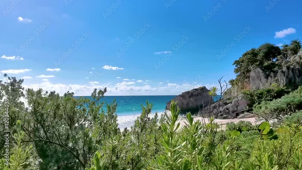 Rock at natural seascape panorama beach view Tulum ruins Mayan site Mexico. Rock at natural seascape panorama beach view Tulum ruins Mayan site Mexico.
