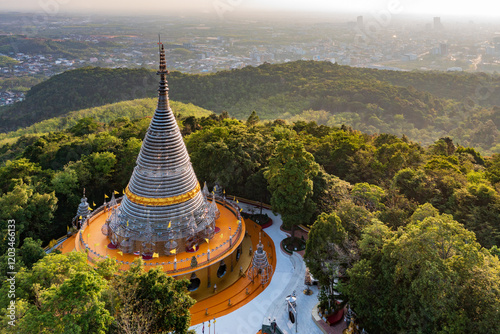 Aerial view landscape of Phra Maha Chedi Tripob Trimongkol (Stainless Pagoda) on Kho Hong mountain, Hatyai, Songkhla, Thailand. photo