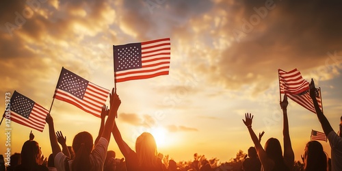 Photo of a crowd waving American flags during a sunset, glowing sky creating a warm atmosphere, Independence Day celebration outdoors, patriotic spirit, selective focus

