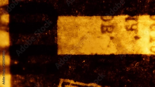Scraps of an old Soviet newspaper.  Abstract loopable animation. 35mm film
