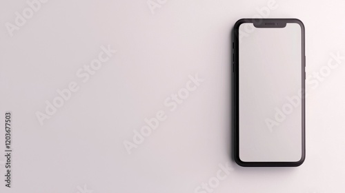 A sleek smartphone is displayed against a minimalist background, showcasing its modern design and empty screen.