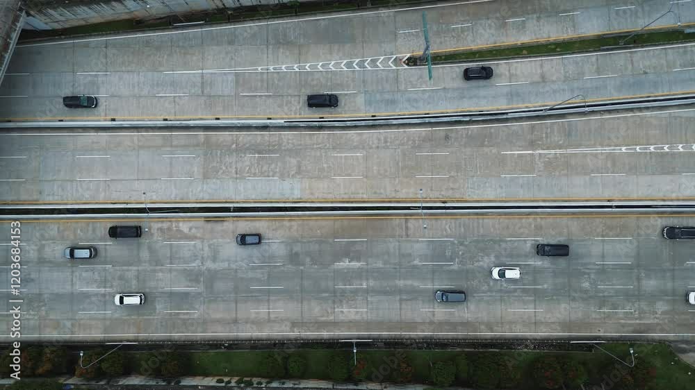 Overhead shot of highway traffic. Cars driving on multi-lane highway. Drone footage. Overhead shot of highway traffic. Cars driving on multi-lane highway. Drone footage.