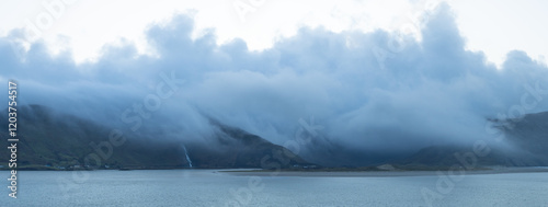 Panorama. View of mountains in the fog and a Assaranca waterfall. Donegal, Ardara. 