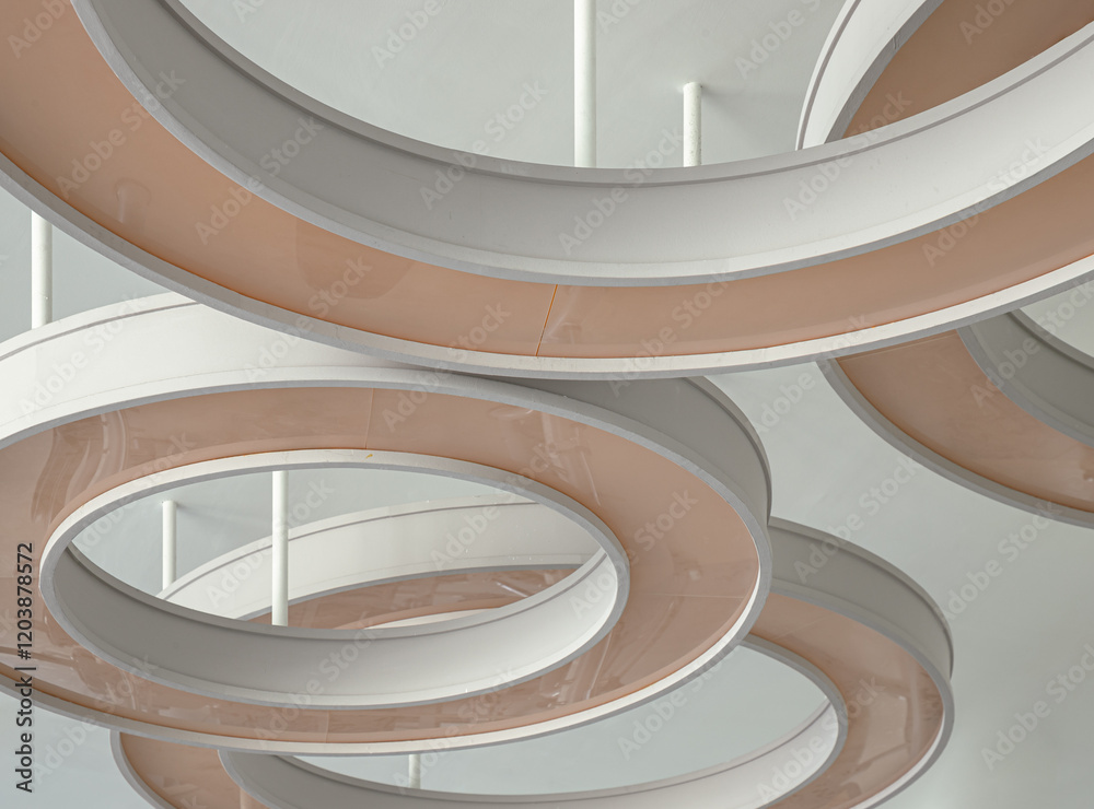 The Rounded ceiling mounted light fixtures with modern LED light bulb. The circular ring shaped lamps hang under ceiling, Architecture and interior design round lights on ceiling, Space for text.