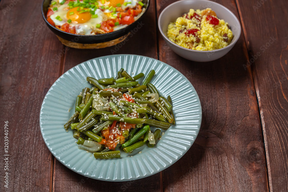 Jewish food tzimmes, chelnt, shakshuka and couscous with dried fruits