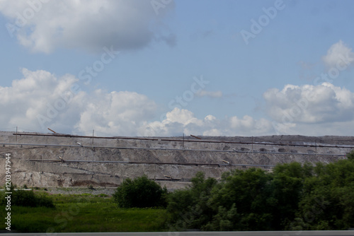 view of the construction site of a new road bridge over the river. Beautiful natural background.