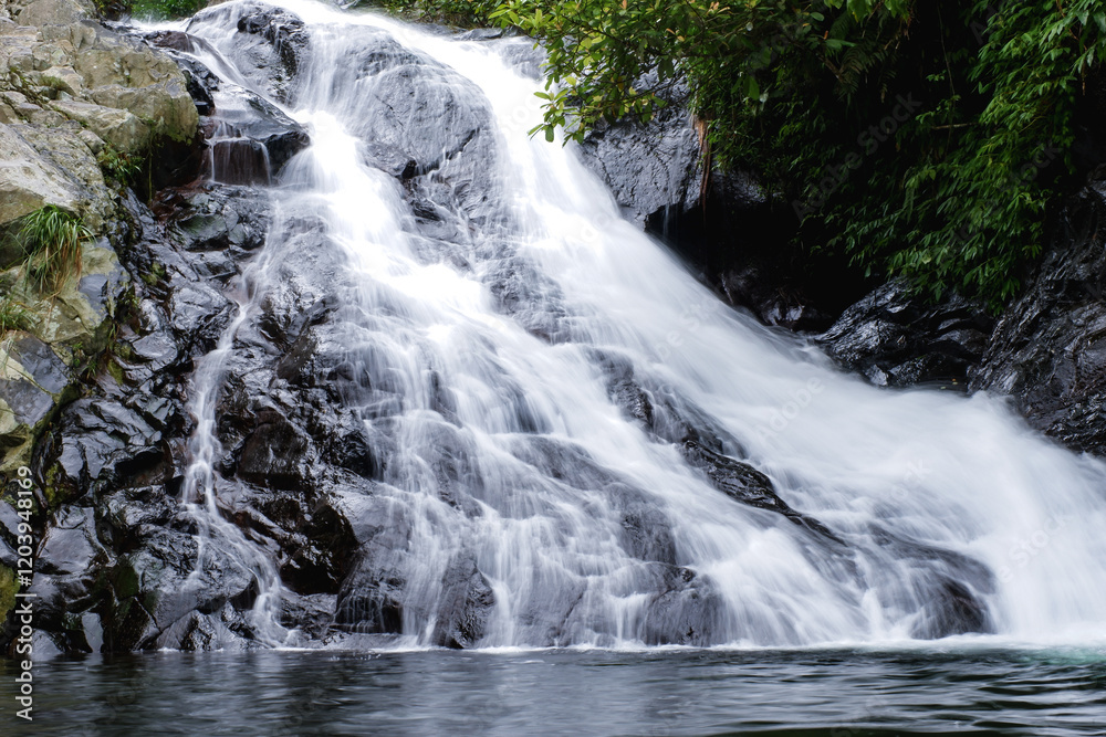 waterfall in the mountains with clear water waterfall in the mountains with clear water