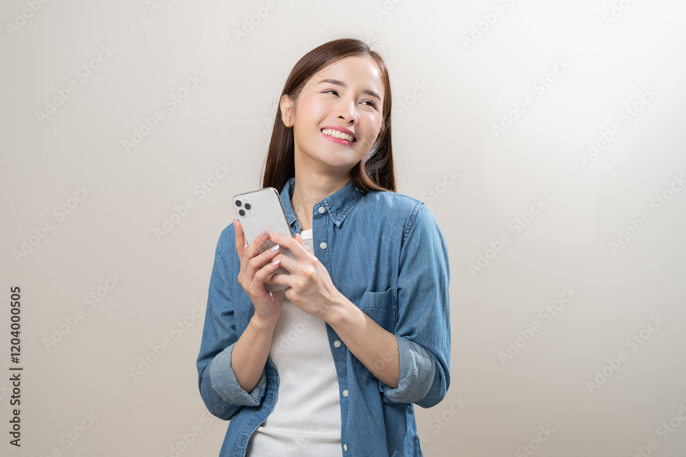 Happy asian young woman using mobile smart phone, read good news online, laugh excited getting offer, great positive surprise, celebrate success on smartphone. Smile girl isolated on white background. Happy asian young woman using mobile smart phone, read good news online, laugh excited getting offer, great positive surprise, celebrate success on smartphone. Smile girl isolated on white background.
