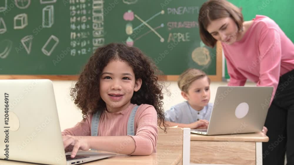 Attractive girl coding prompt while looking at camera at STEM class while happy teacher checking smart boy software program. Diverse student study about programing code and computing system. Pedagogy. Attractive girl coding prompt while looking at camera at STEM class while happy teacher checking smart boy software program. Diverse student study about programing code and computing system. Pedagogy.