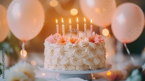 Celebration Cake with Candles and Balloons for a Special Occasion or Birthday