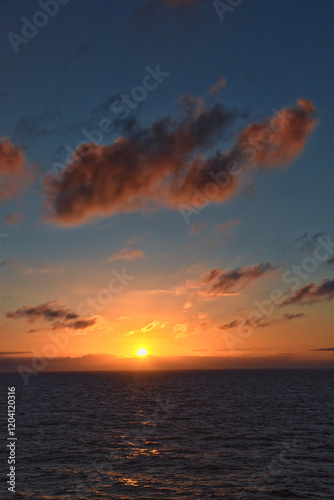 Obraz na płótnie Nordic Ocean Sunrise of the coast of Norway from boat, Summer 2024, Scandinavia, Europe.
w salonie