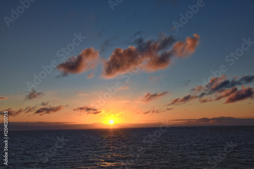 Obraz na płótnie Nordic Ocean Sunrise of the coast of Norway from boat, Summer 2024, Scandinavia, Europe.
w salonie