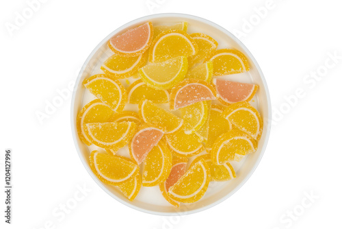 Bright and colorful citrus candy slices arranged in a bowl featuring an assortment of orange and lemon flavors enjoyed during a sunny afternoon gathering, isolate on white.