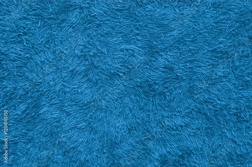 Blue fur texture top view. Blue sheepskin background	