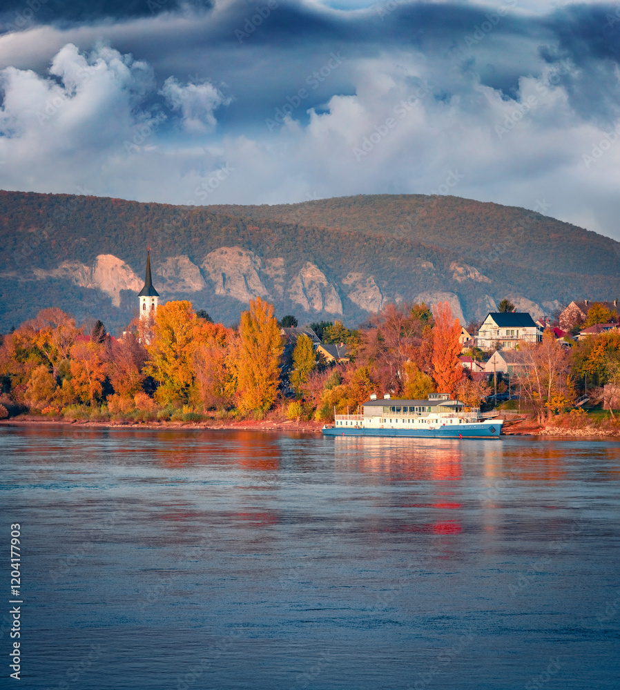 Dramatic evening view of Danube river. Incredible autumn cityscape of Esztergom town, Komarom-Esztergom County. Spectacular outdoor scene of Hungary, Europe. Traveling concept background.