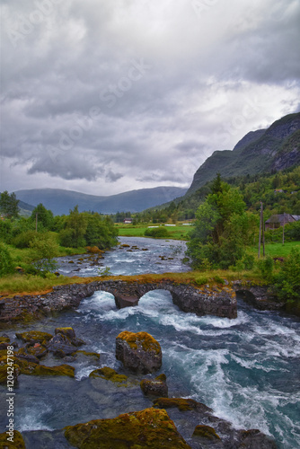 Obraz na płótnie Olden Norway 2024 hiking views towards Briksdal Glacier, Jostedal Glacier largest glacier on Europe's mainland. Glacial river flowing to Sognefjord. Scandinavia, Nordic. w salonie
