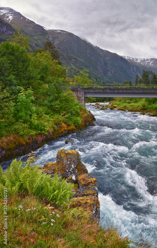 Olden Norway 2024 hiking views towards Briksdal Glacier, Jostedal Glacier largest glacier on Europe's mainland. Glacial river flowing to Sognefjord. Scandinavia, Nordic.