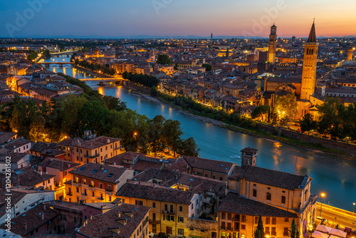 Verona aerial panoramic cityscape of old town historic district with church towers, River Adige, famous landmarks, town squares from Castel San Pietro fortress. Verona Italy panorama skyline at sunset