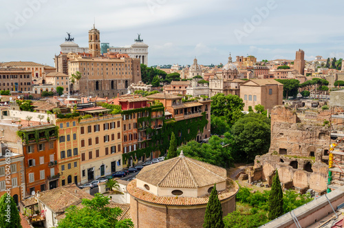 Canvas-taulu Rome aerial panoramic cityscape of the Roman Forum ancient Roman ruins, Capitoline Museums, ivy covered buildings, Vittorio Emanuele II Monument on a sunny day, no people