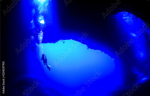 Scuba diving underwater. Underwater scuba diver in deep blue depth