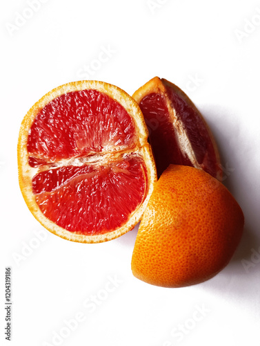 cut grapefruit on white background