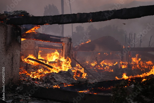 Buildings engulfed in flames in the Palisades fire
