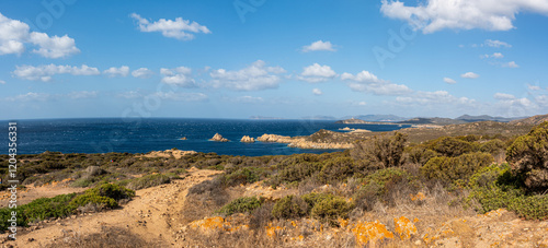 Obraz na płótnie Landscape of the south-west coast of Sardinia with cliffs, blue sea, fjords and white clouds w salonie