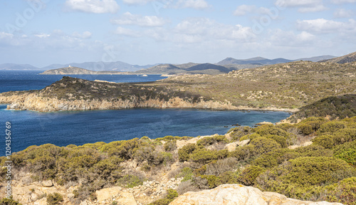 Obraz na płótnie Landscape of the south-west coast of Sardinia with cliffs, blue sea, fjords and white clouds w salonie