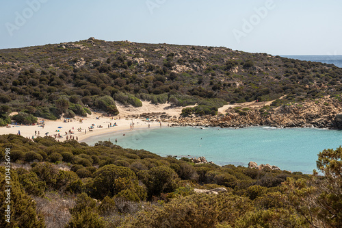 Obraz na płótnie The beautiful beach of Cala Cipolla in Chia in Sardinia, with white sand and transparent and turquoise water w salonie