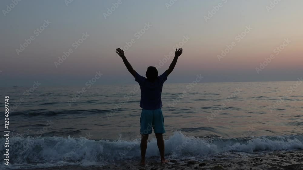 Silhouette of sad depressed man on beach Silhouette of sad depressed man on beach