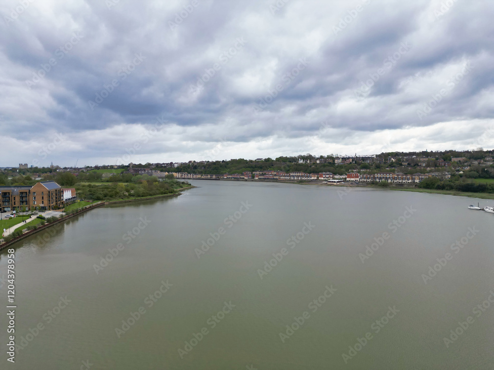 High Angle View of River Thames at Rochester Town in the Unitary of Medway and Located at Kent, England United Kingdom. High Angle Drone's Camera Footage was Captured on April 20th, 2024 High Angle View of River Thames at Rochester Town in the Unitary of Medway and Located at Kent, England United Kingdom. High Angle Drone's Camera Footage was Captured on April 20th, 2024