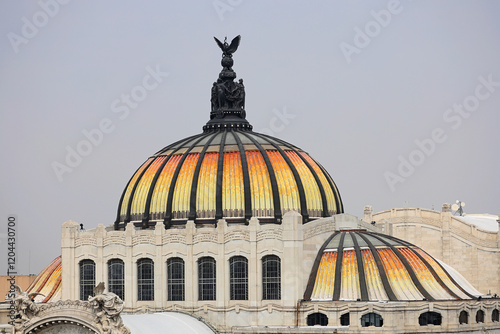 dome roof of Palacio de Bella Artes with Victoria statue on top in Mexico City