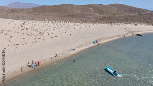 Aerial drone cinematic video of secluded paradise sandy beaches and natural sand dunes in inhabited small island of Antipsara, North Aegean sea, Greece photo