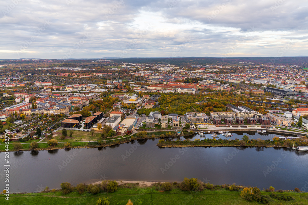 Fototapeta premium Panoramic view of Dresden from hot air balloon. Elbe River flows through city, creating picturesque landscape. Germany. Aerial view